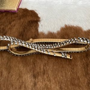 Women’s rhinestone  belt expands 24” to 36”.